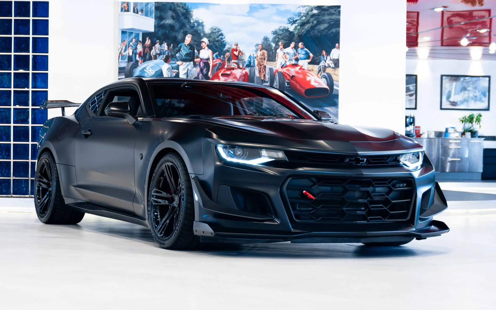 Satin black Chevrolet Camaro ZL1 1LE, full front three-quarter view