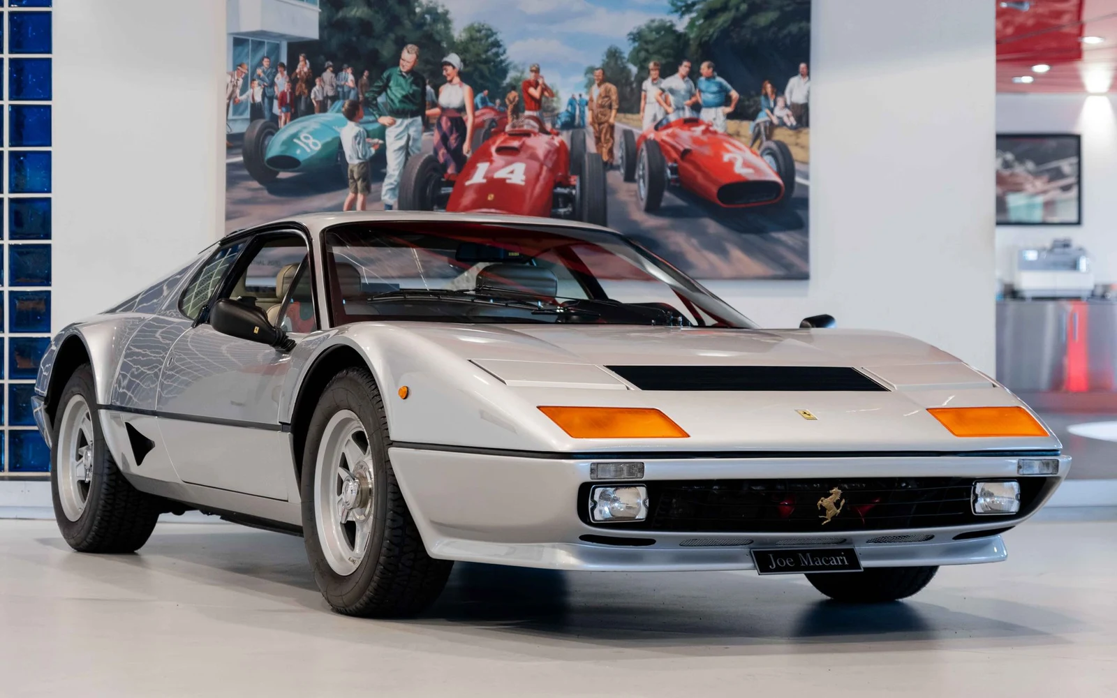 Silver and black Ferrari 512 BBi, full front three-quarter view