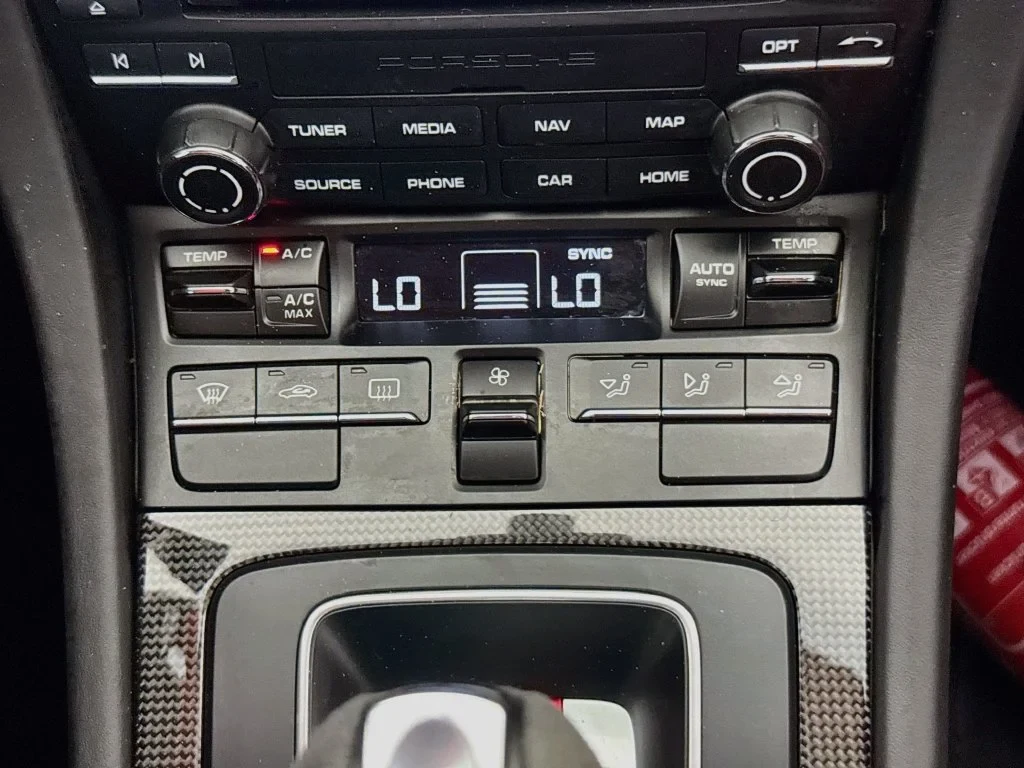 2018 Porsche 911 GT2 RS interior, center console, Black, with red accents