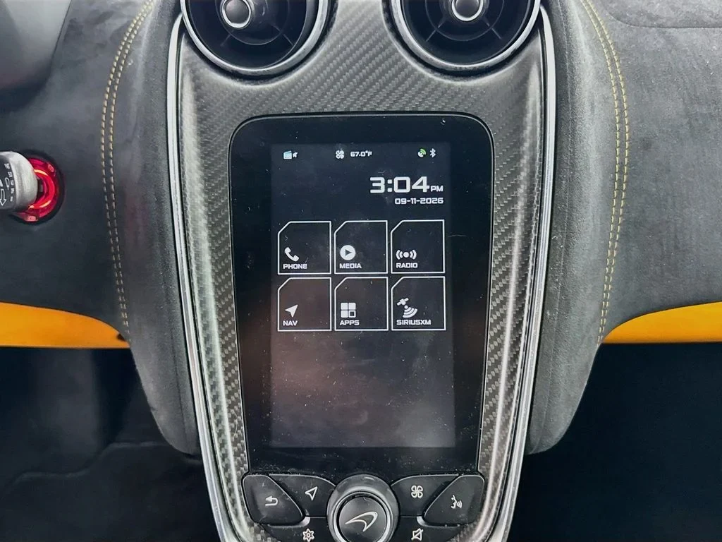2019 McLaren 570S interior, Carbon Black, with orange accents