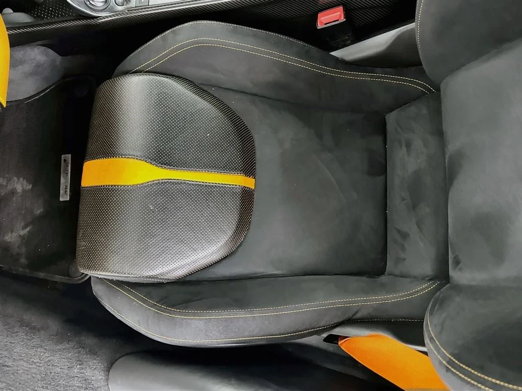 2019 McLaren 570S interior, seats, Carbon Black, with orange accents