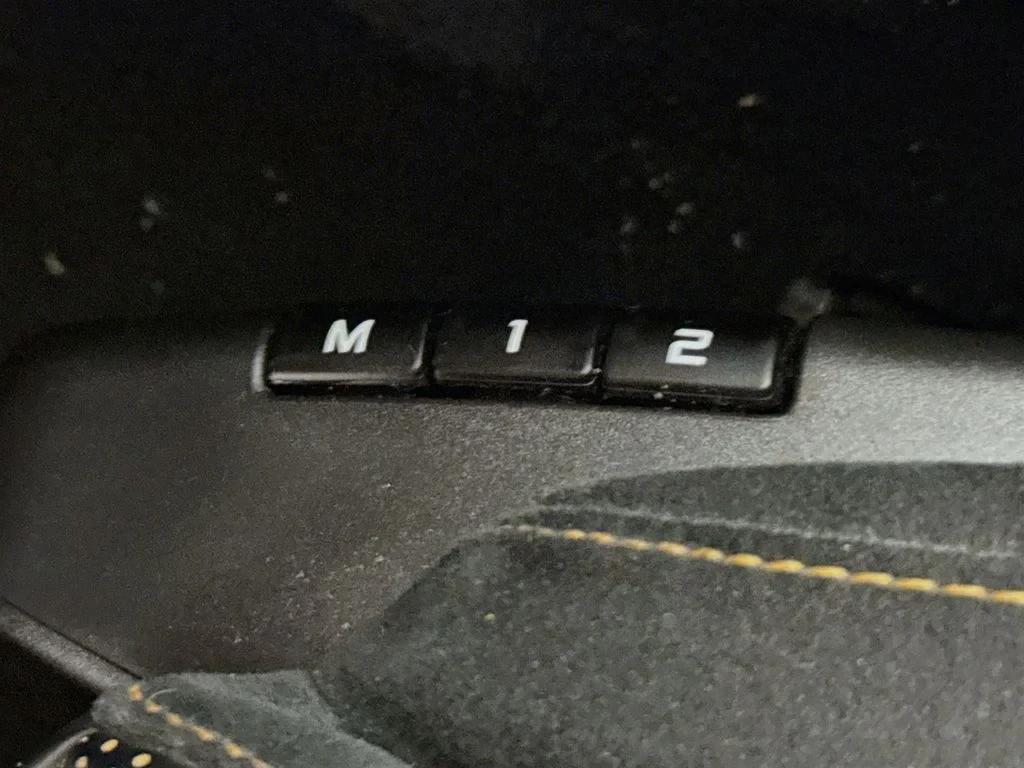 2019 McLaren 570S interior, Carbon Black, with orange accents
