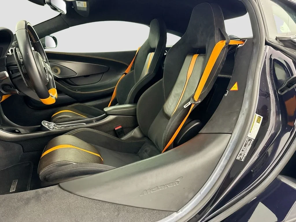 2019 McLaren 570S interior, seats, Carbon Black, with orange accents