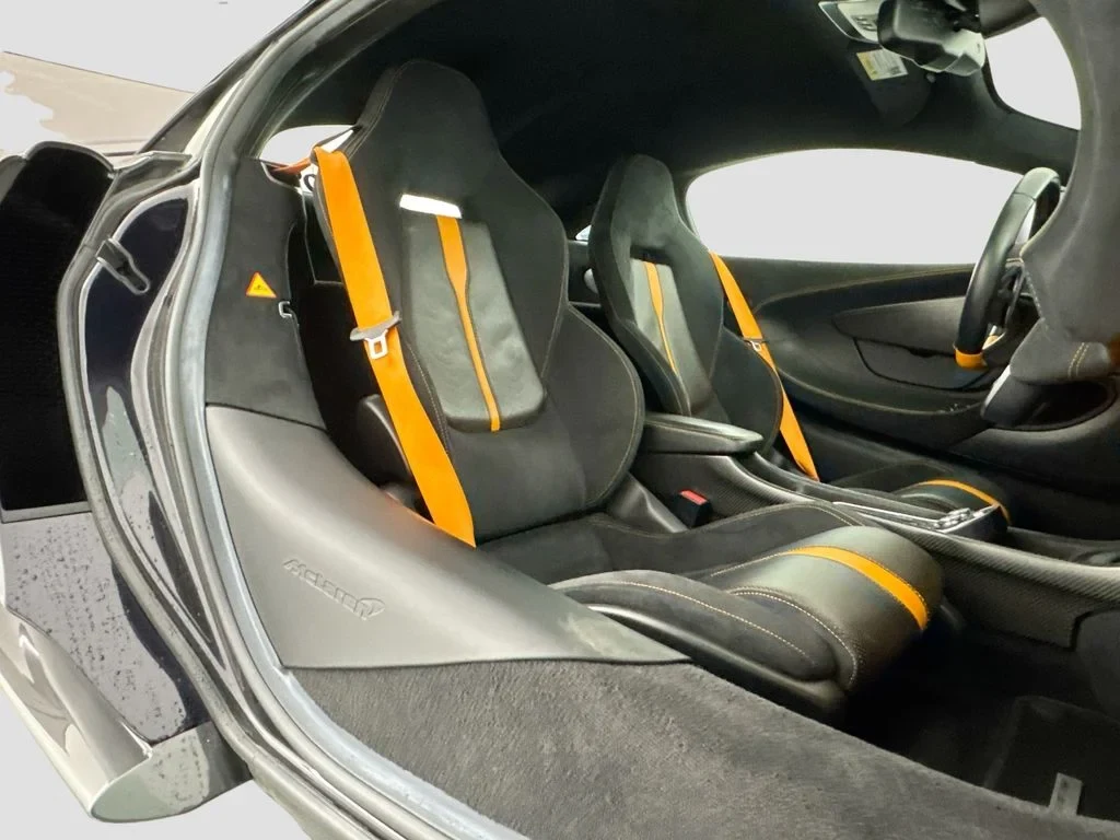 2019 McLaren 570S interior, seats, Carbon Black, with orange accents