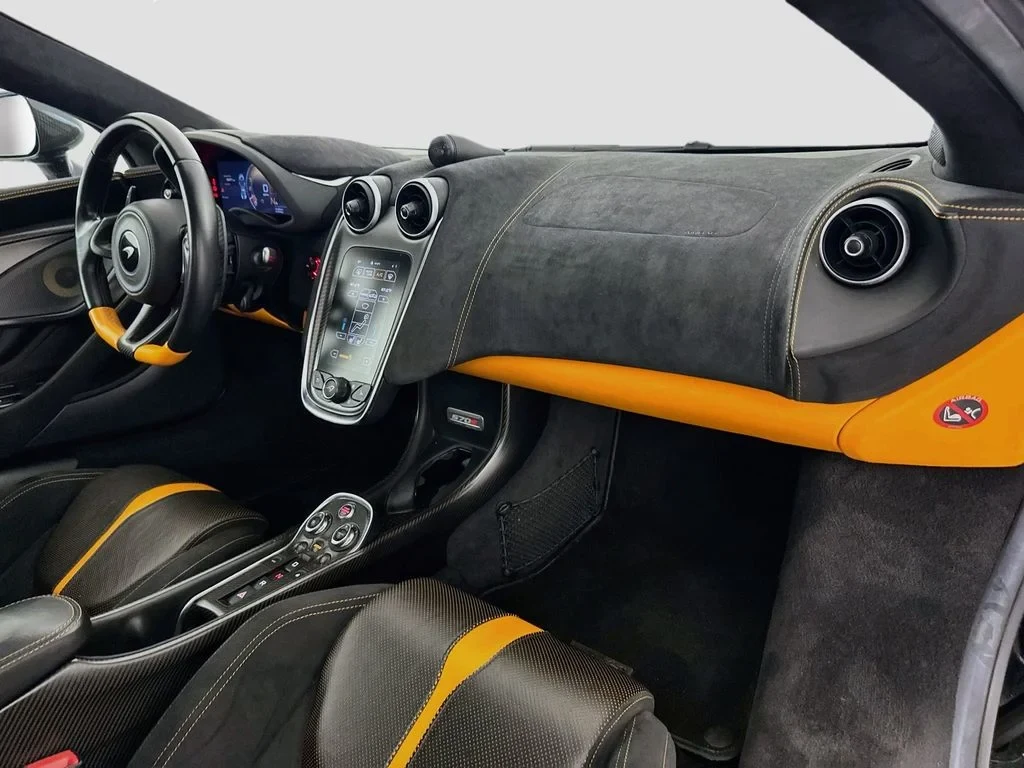 2019 McLaren 570S interior, Carbon Black, with orange accents