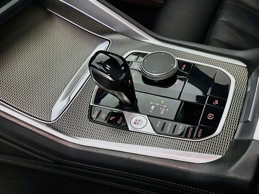 2020 BMW X6 M50i interior, center console, Black