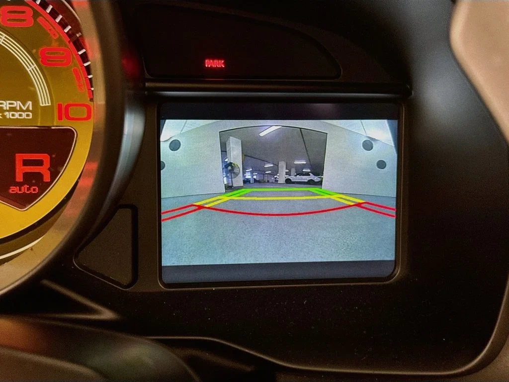 2021 Ferrari F8 Spider interior, door panel, Tan leather (as seen in the photographs)