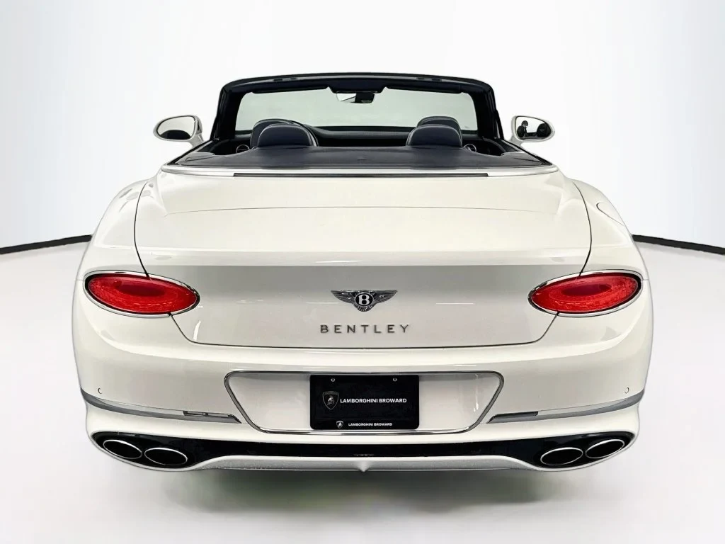 2022 Bentley Continental GT V8 Convertible, rear three-quarter view, White
