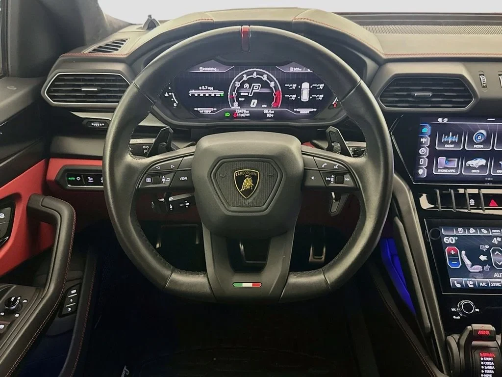 2023 Lamborghini Urus S interior, dashboard, Black, with red accents