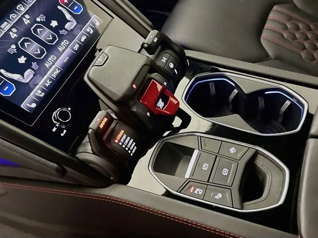 2023 Lamborghini Urus S interior, center console, Black, with red accents