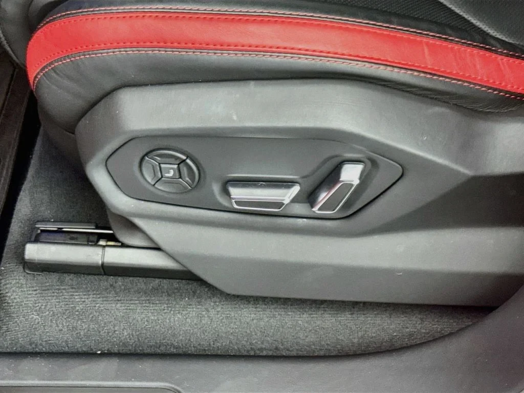 2023 Lamborghini Urus S interior, door panel, Black, with red accents