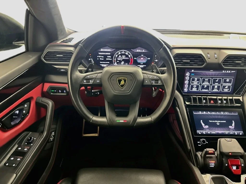 2023 Lamborghini Urus S interior, dashboard, Nero Ade, with red accents