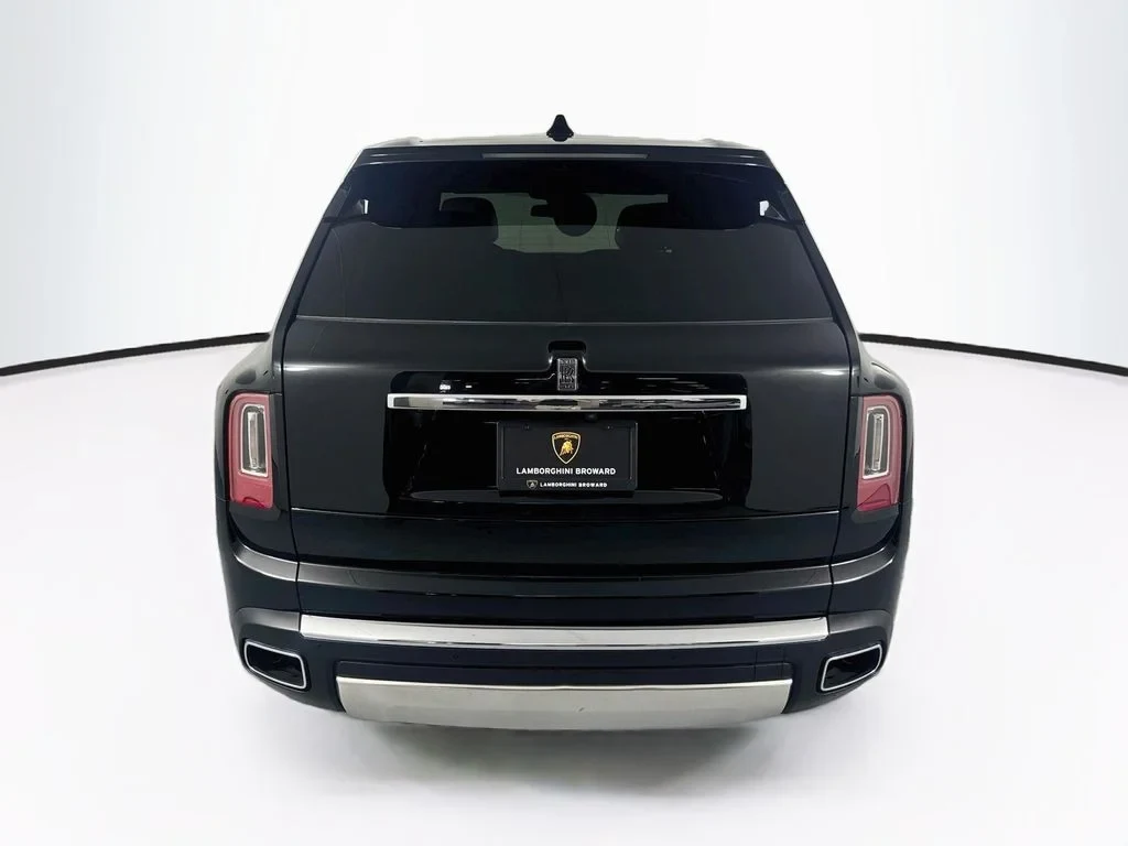 2023 Rolls-Royce Cullinan, rear three-quarter view, Black