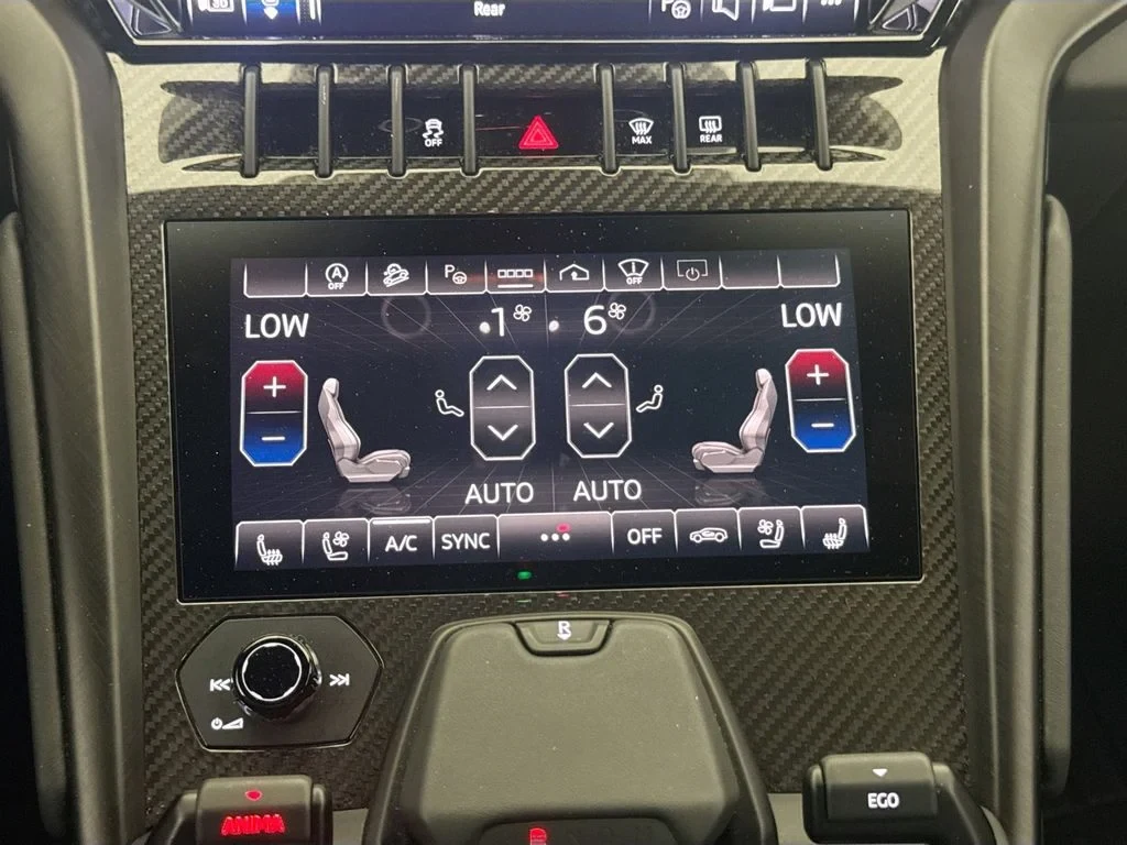 2024 Lamborghini Urus S interior, Black (as seen in the photographs)