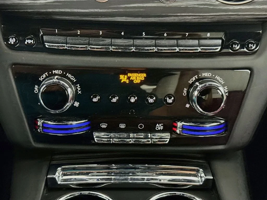 2024 Rolls-Royce Spectre interior, center console, Black, with red leather