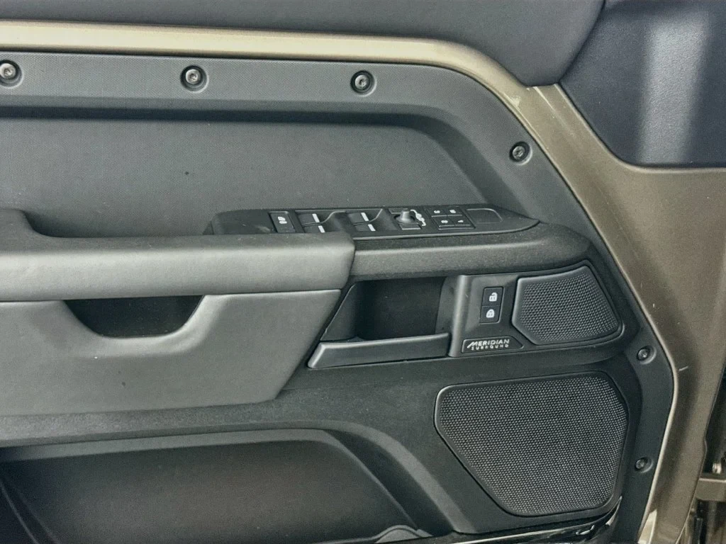 2025 Land Rover Defender 110 OCTA interior, door panel, Ebony