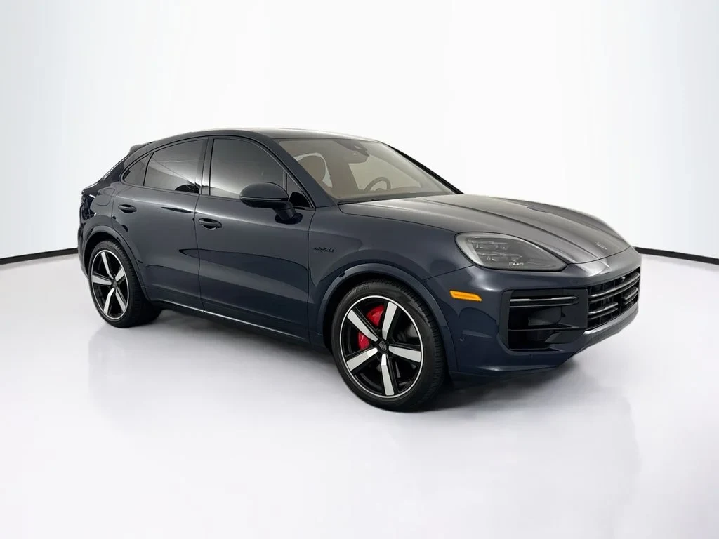2025 Porsche Cayenne Turbo E-Hybrid Coupe for sale, front three-quarter view, Blue