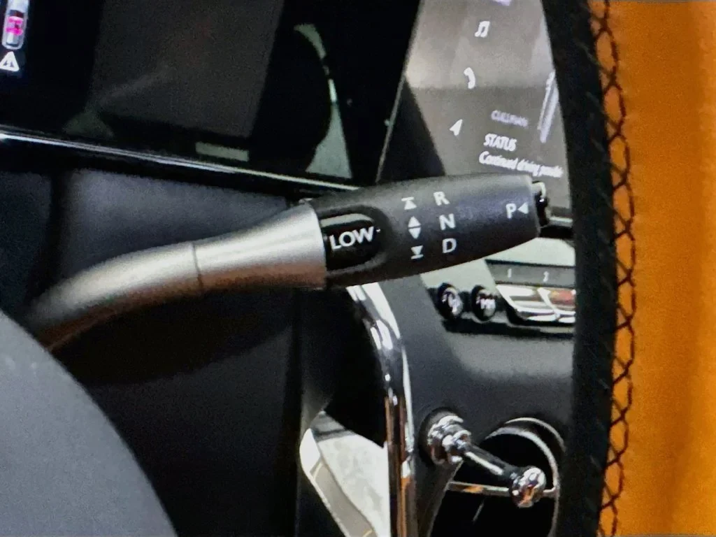 2026 Rolls-Royce Cullinan Series II interior, center console, Fire Opal Orange