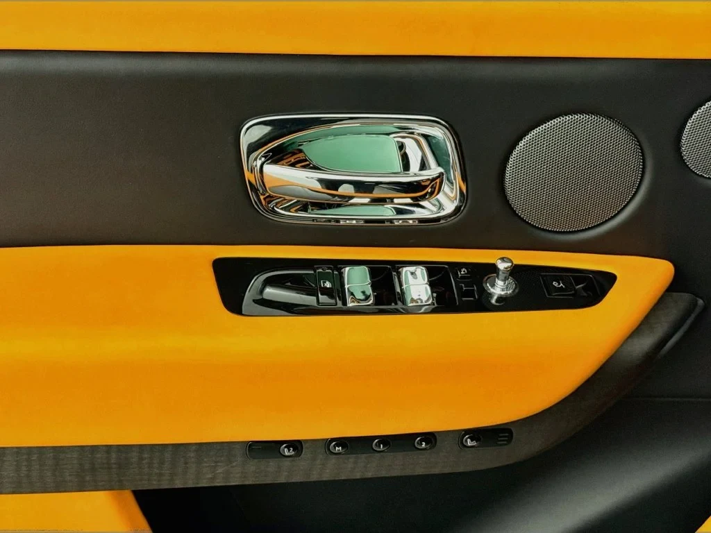 2026 Rolls-Royce Cullinan Series II interior, door panel, Fire Opal Orange