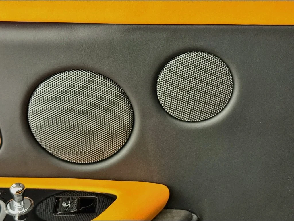 2026 Rolls-Royce Cullinan Series II interior, door panel, Fire Opal Orange