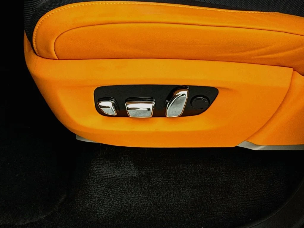 2026 Rolls-Royce Cullinan Series II interior, door panel, Fire Opal Orange