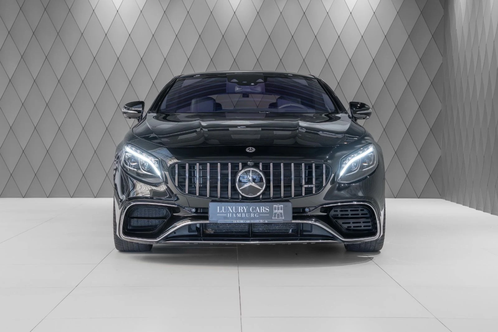 Black Mercedes-AMG S 63 4MATIC+ Coupe, full front view