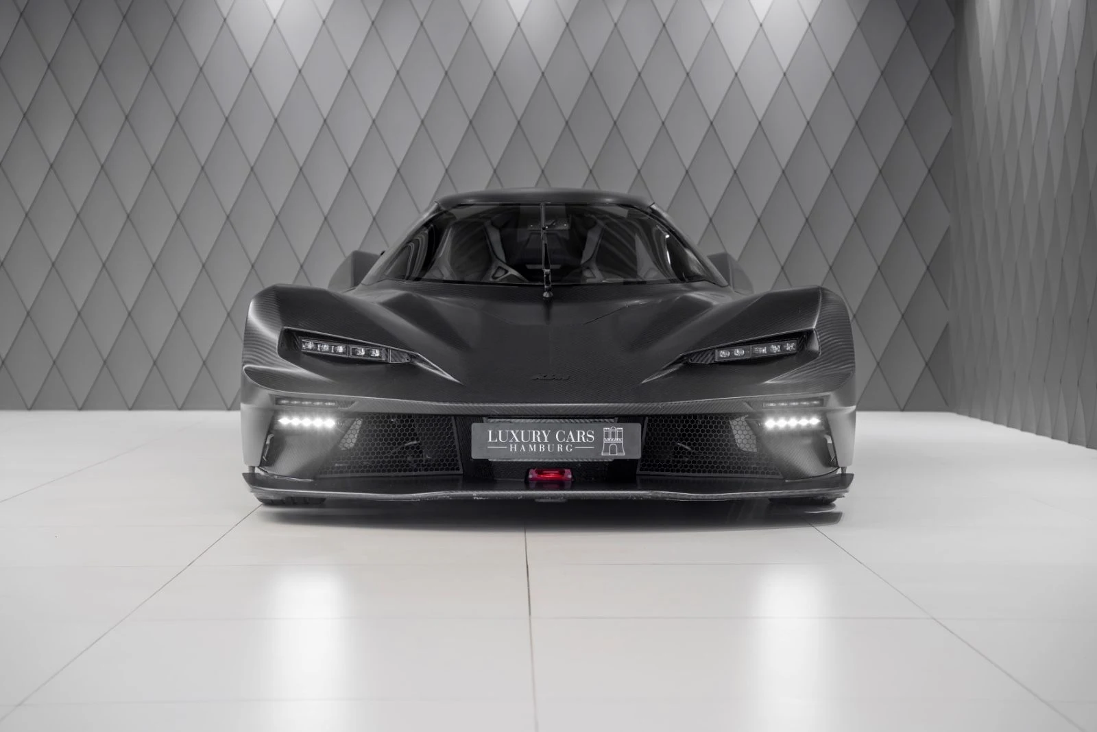 Gray and carbon KTM X-Bow GT-XR, full front view