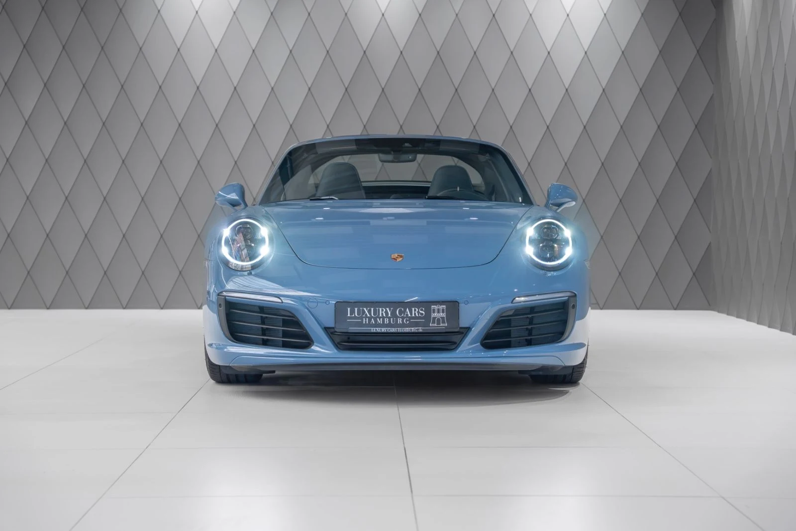 Blue Porsche 911 Targa 4S Exclusive Edition, full front view