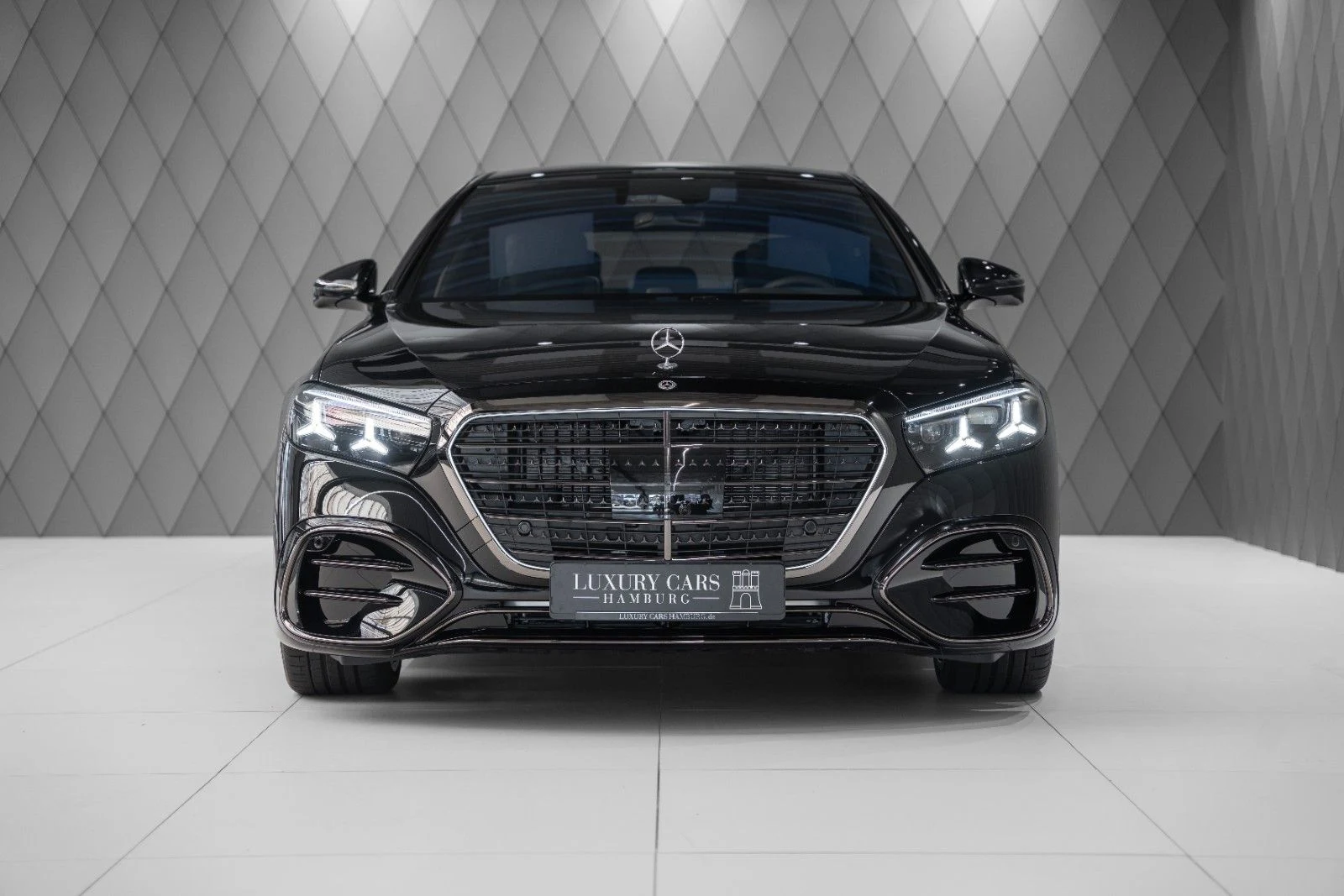 Black Mercedes-Benz S 580 4MATIC L, full front view