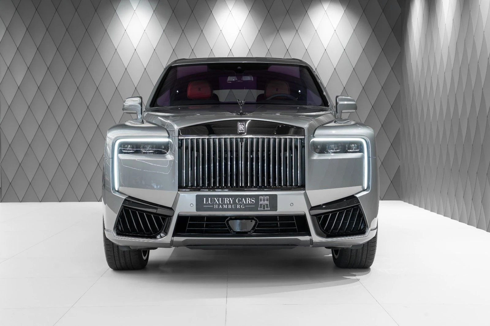 Silver Rolls-Royce Cullinan Black Badge, full front view