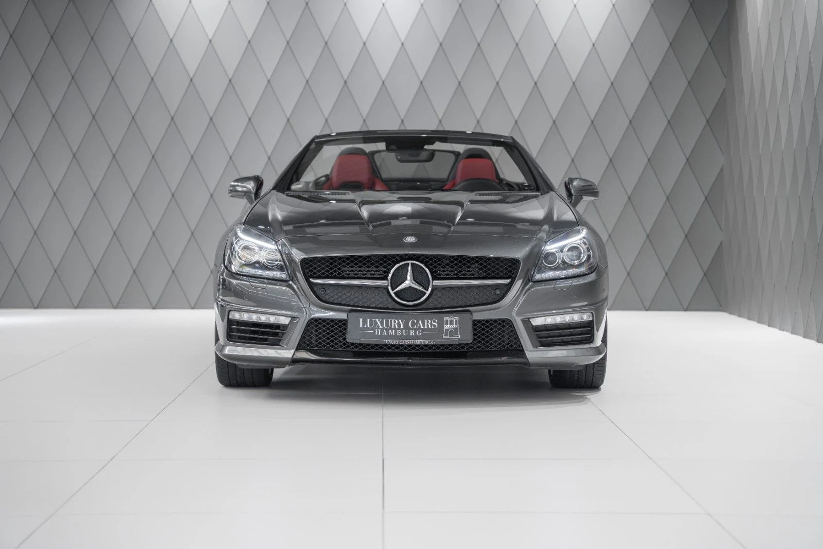 Gray Mercedes-AMG SLK 55, full front view