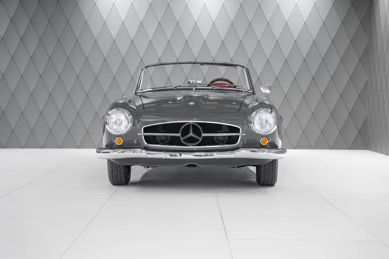Gray Mercedes-Benz 190 SL, full front view