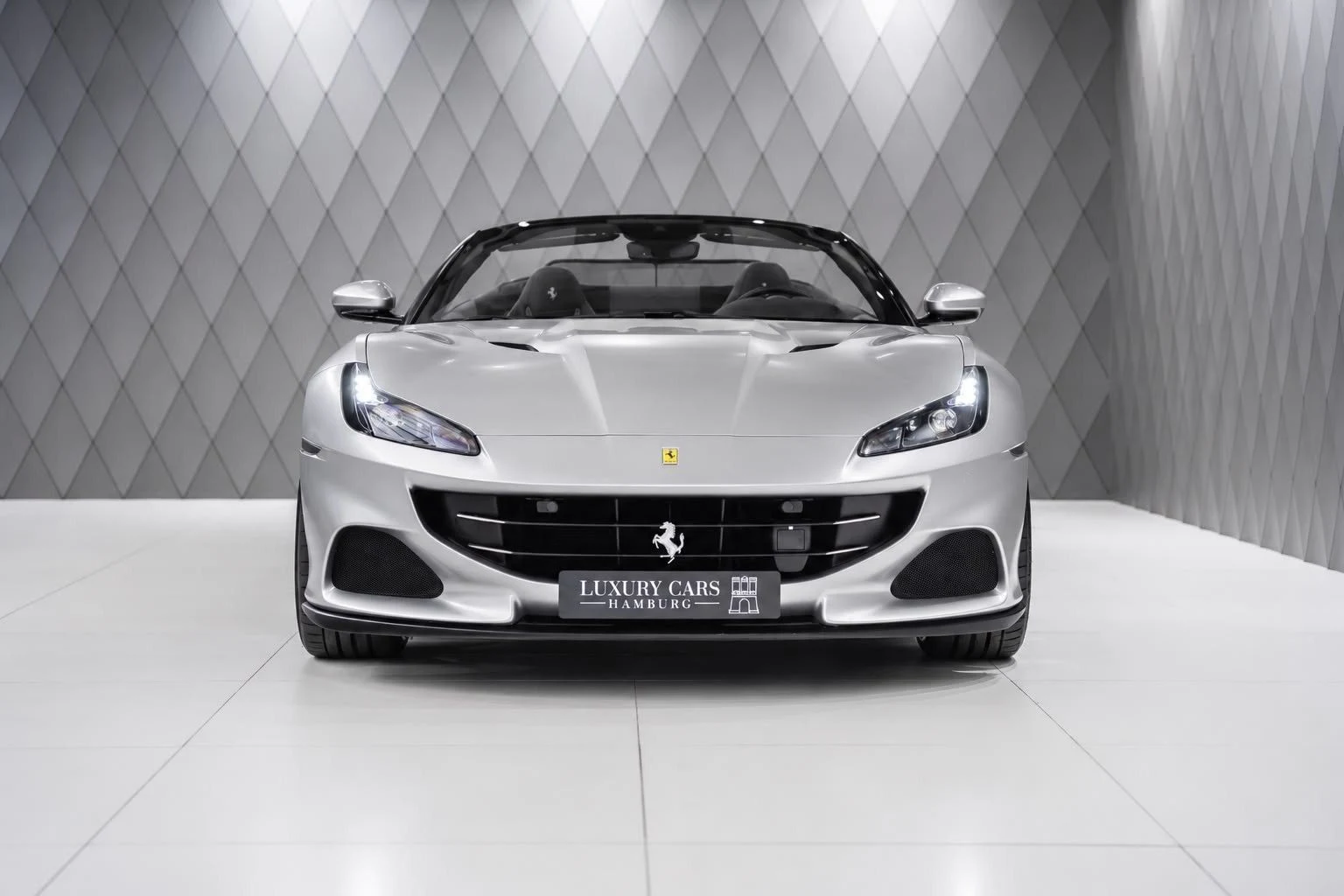 Silver Ferrari Portofino M, full front view