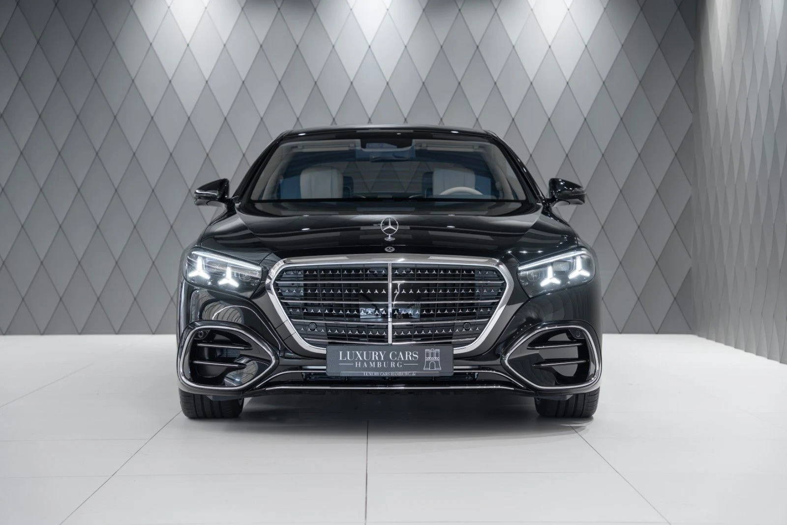 Black Mercedes-Benz S 580 4MATIC L, full front view