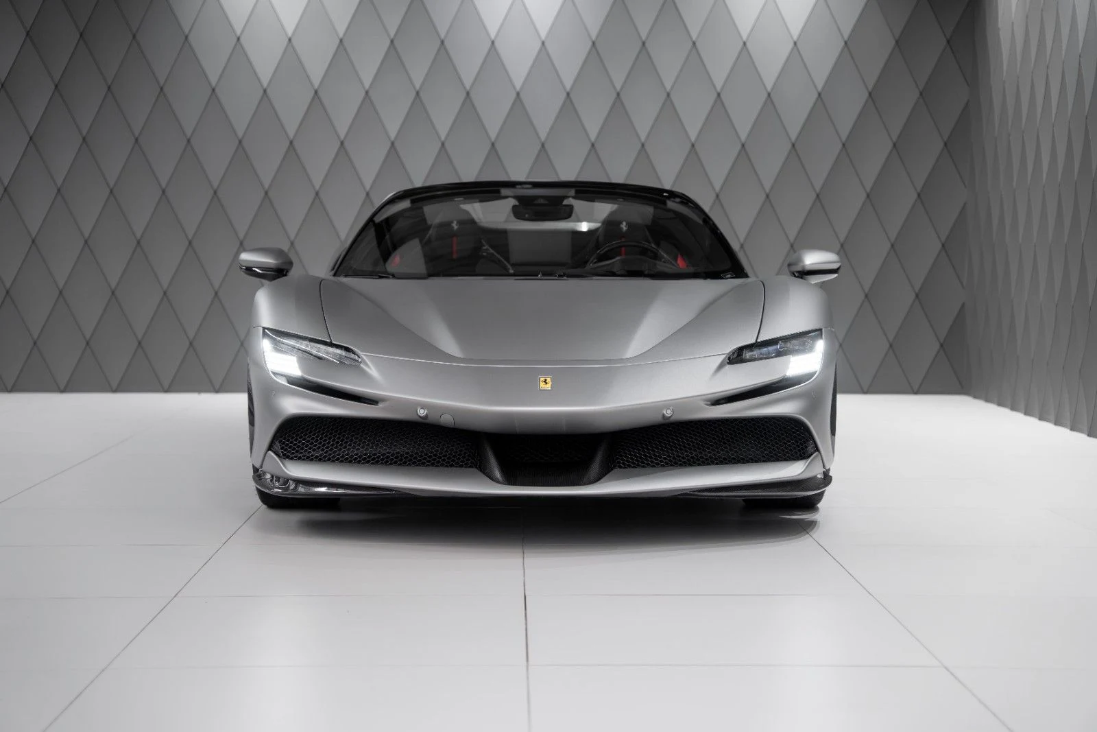 Silver Ferrari SF90 Spider, full front view
