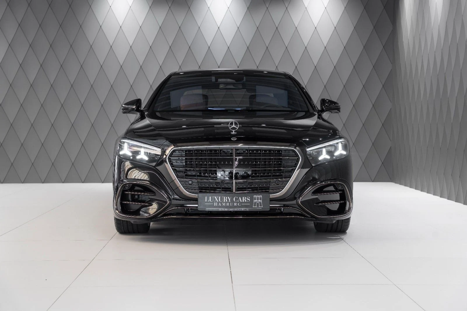 Black Mercedes-Benz S 580 4MATIC L, full front view