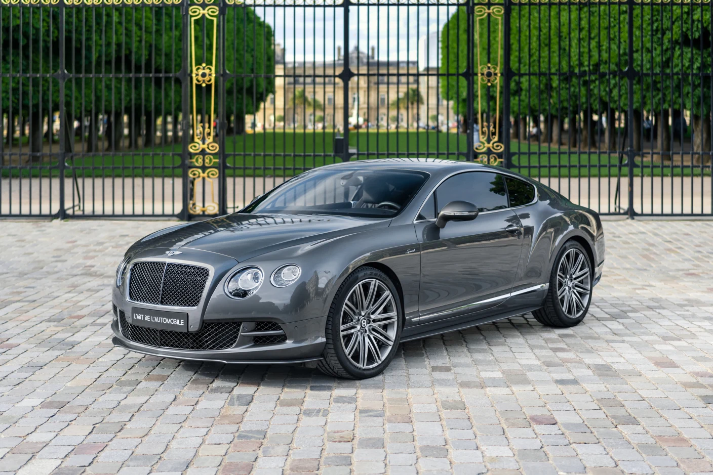 Gray Bentley Continental GT Speed, full front three-quarter view