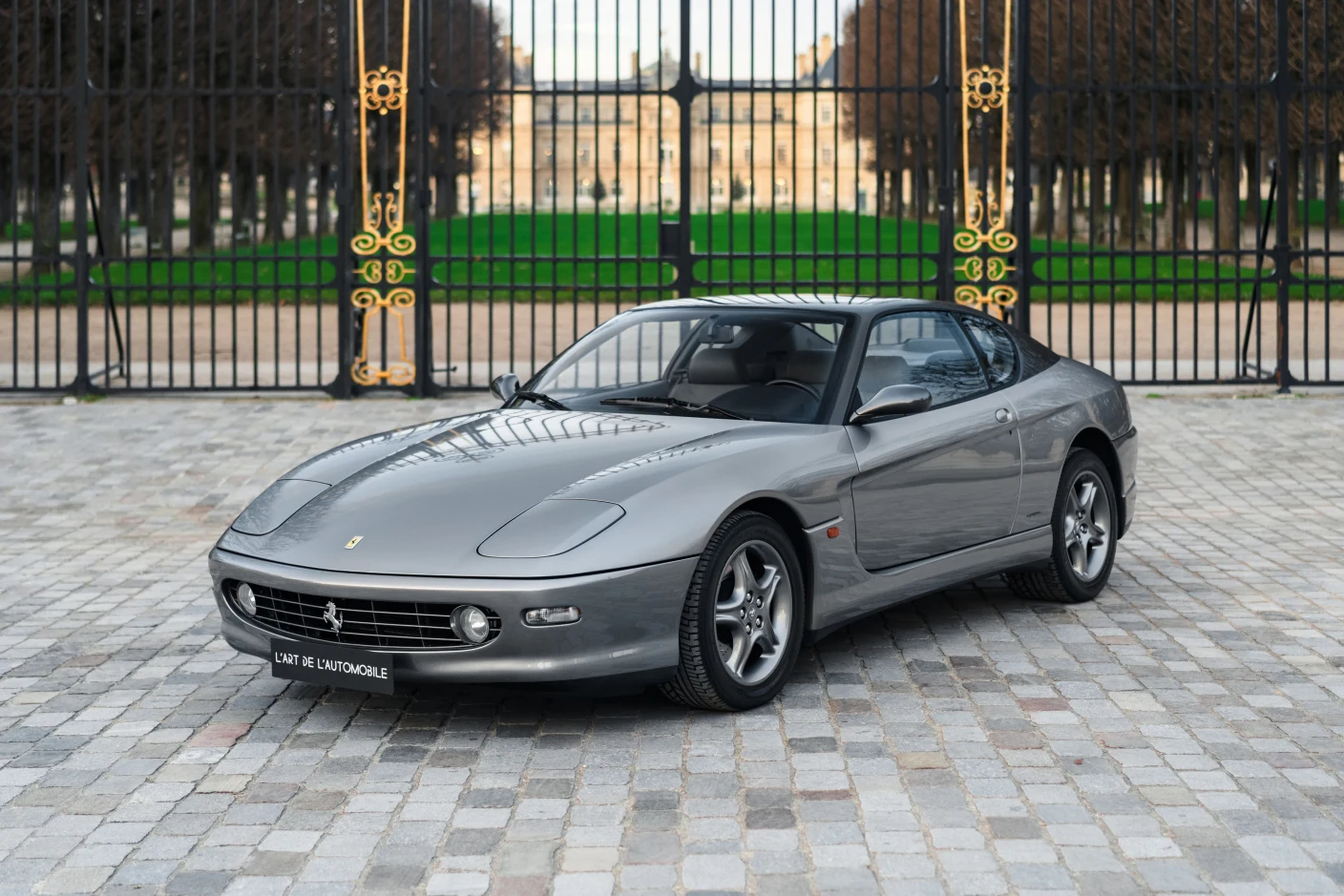 Gray Ferrari 456M GT, full front three-quarter view