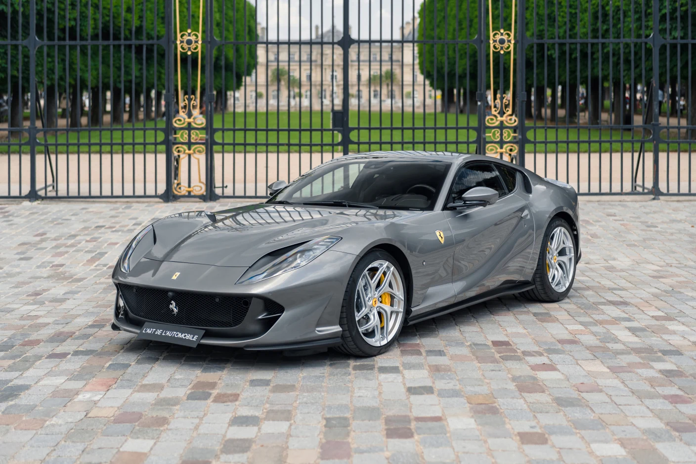 Gray Ferrari 812 Superfast, full front three-quarter view