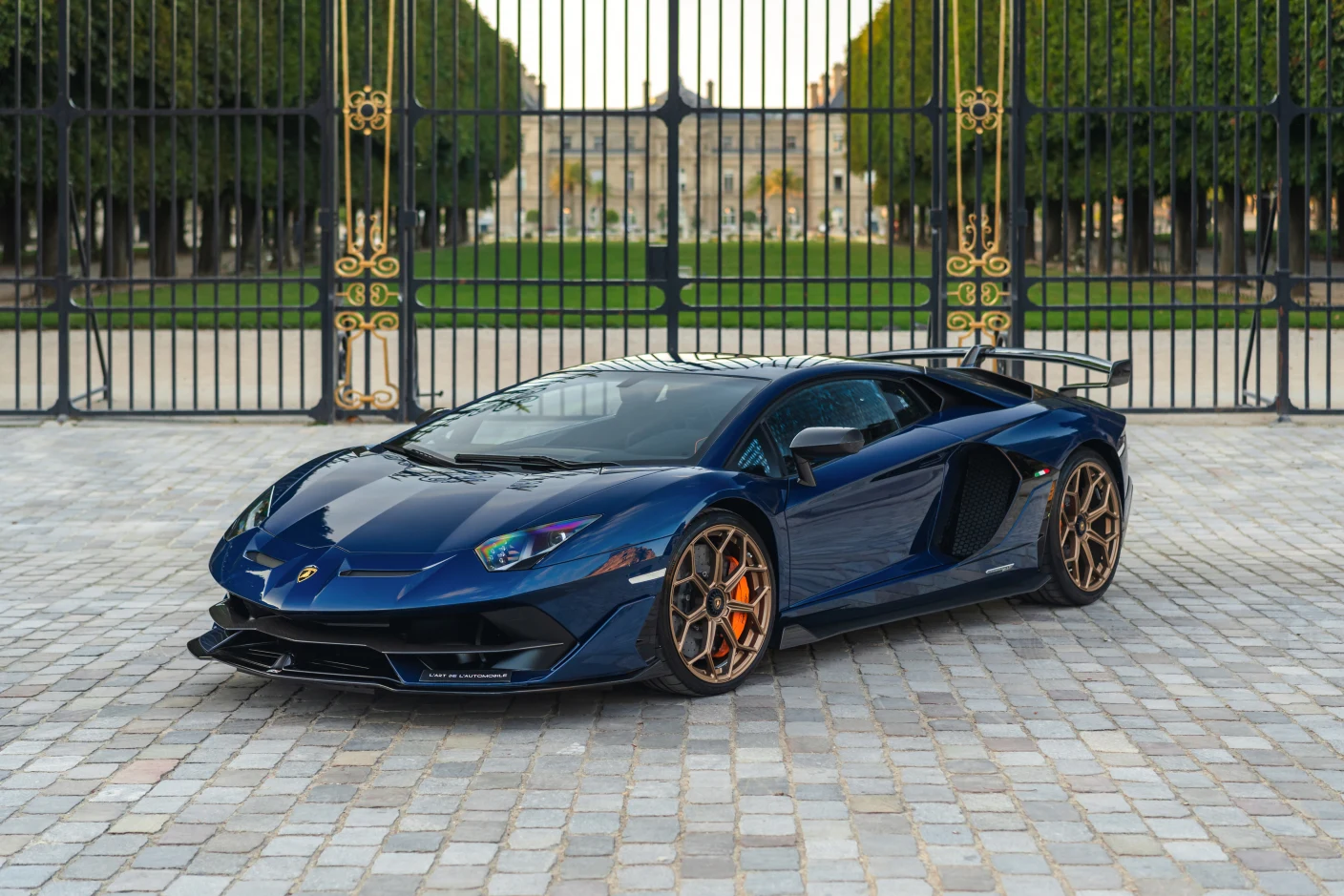 Blue Lamborghini Aventador SVJ, full front three-quarter view