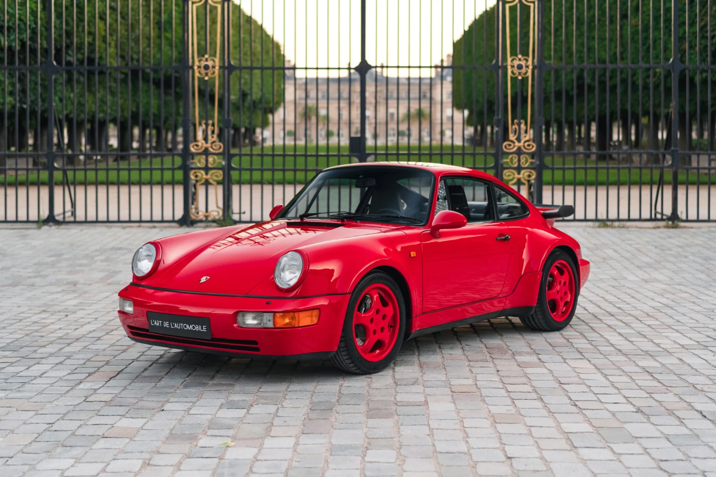 Red Porsche 911 Turbo 3.3 (964), full front three-quarter view