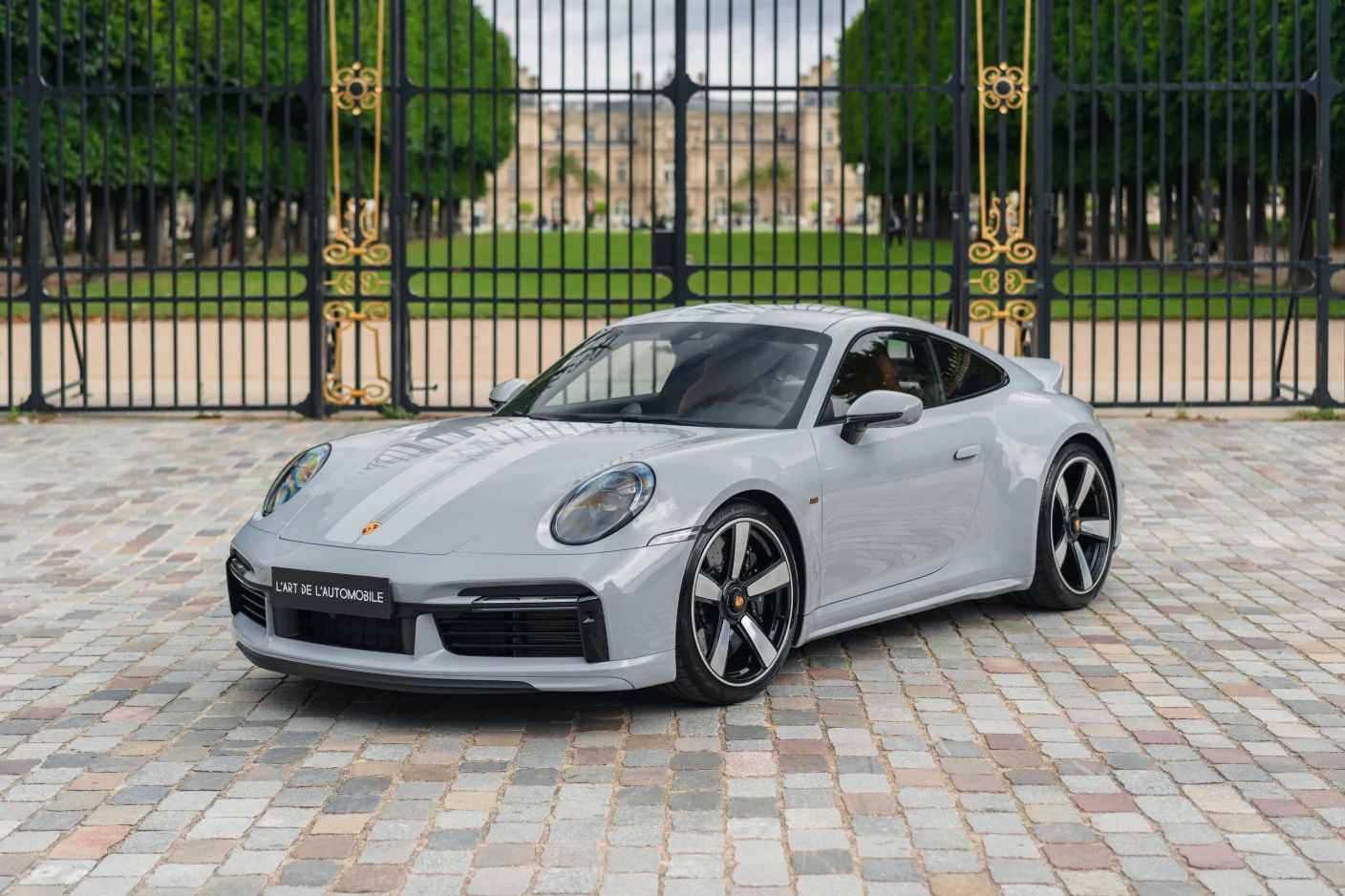 Gray Porsche 911 Sport Classic (992), full front three-quarter view