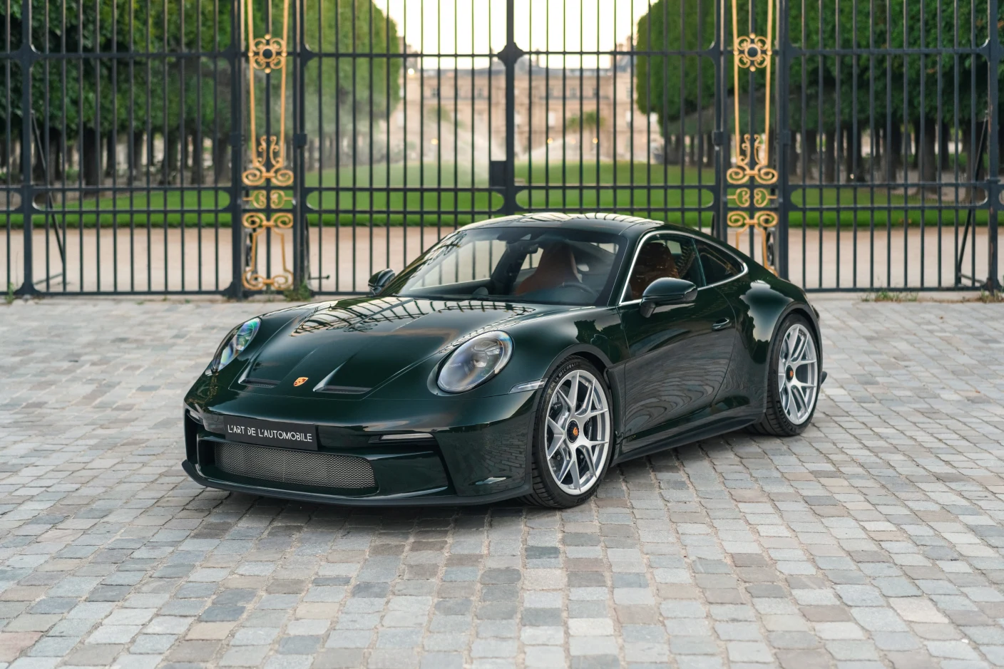 Brewster Green Porsche 911 S/T (992), full front three-quarter view