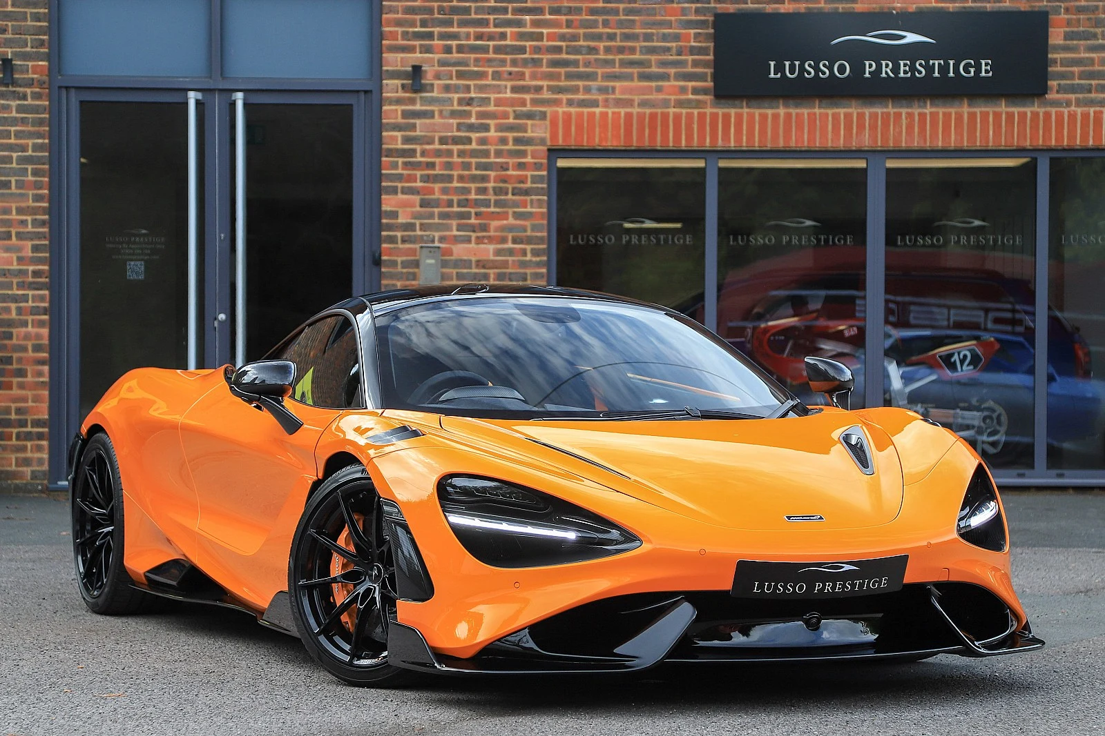 Orange McLaren 765LT, full front three-quarter view