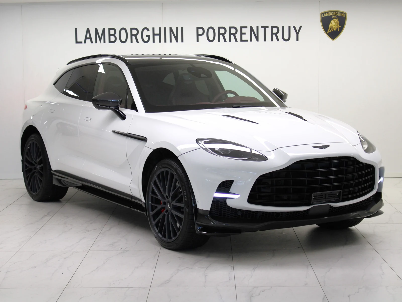 White Aston Martin DBX 707, full front three-quarter view