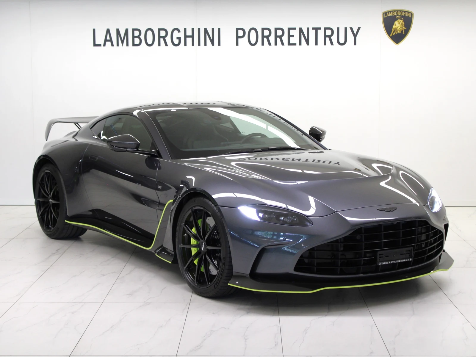 Gray Aston Martin V12 Vantage, full front three-quarter view