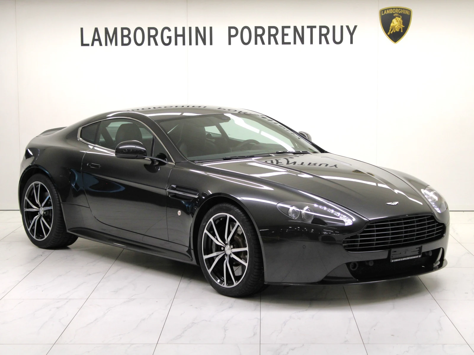 Black Aston Martin V8 Vantage S, full front three-quarter view