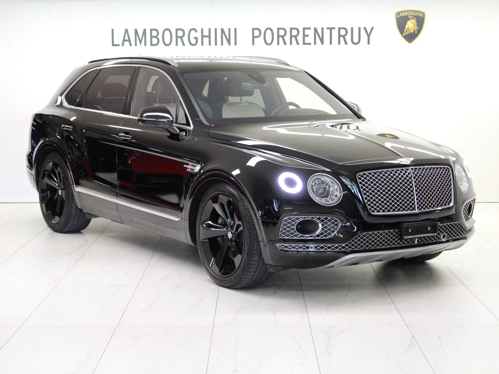 Black Bentley Bentayga W12, full front three-quarter view