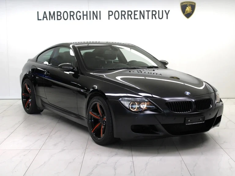 Black BMW M6 (E63), full front three-quarter view