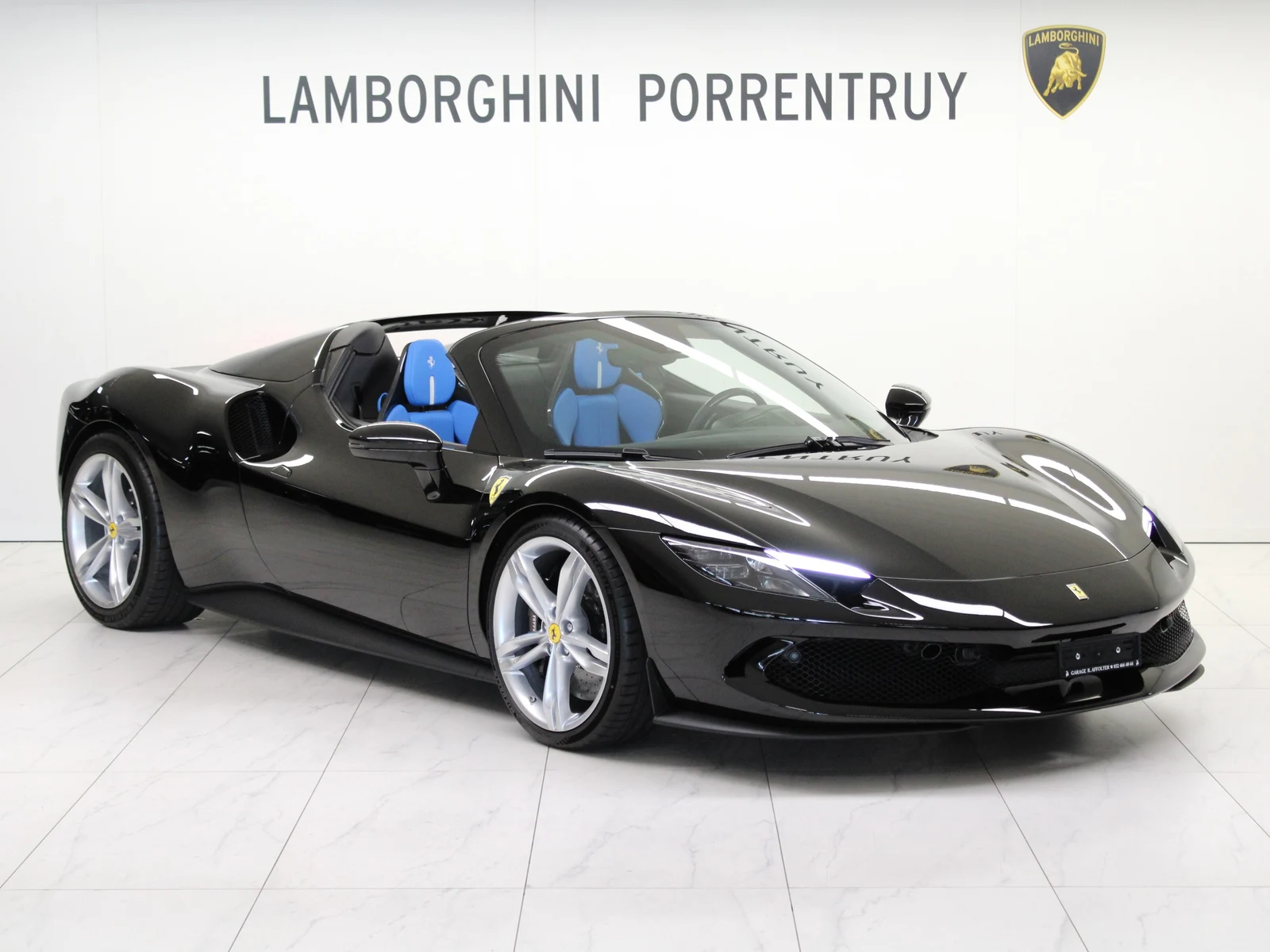 Black Ferrari 296 GTS, full front three-quarter view